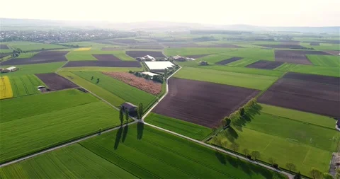 Flight over beautiful agricultural fields. Flight over green agricultural fields Stockbeeldmateriaal 251126802