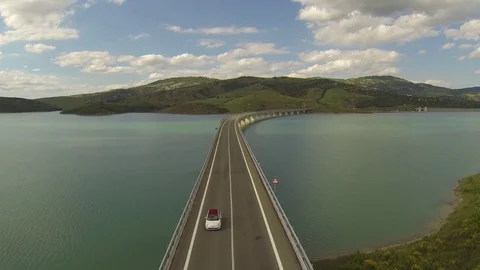 Flight over the beautiful bridge with background mountains Stock Footage 72165644