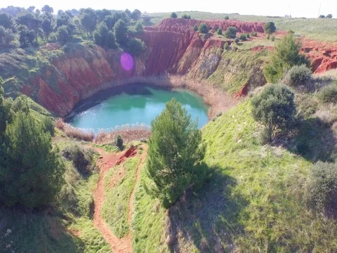 Flight over beautiful colors of the bauxite quarry Stock Footage 72231253