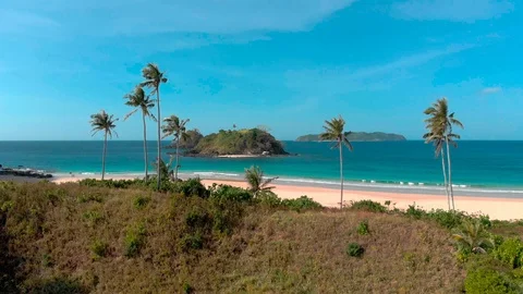 Flight over beautiful empty beach Stock Footage 105698862