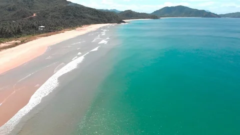 Flight over beautiful empty beach Stock Footage 105763262