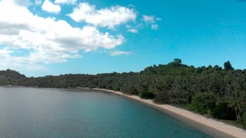 Flight over beautiful empty beach Stock Footage 105771431