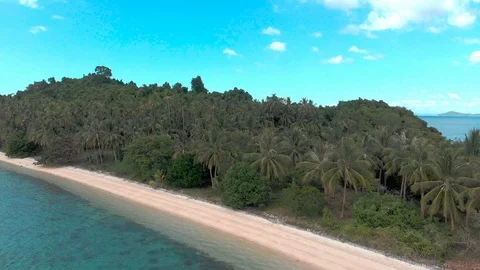 Flight over beautiful empty beach Stock Footage 105774194