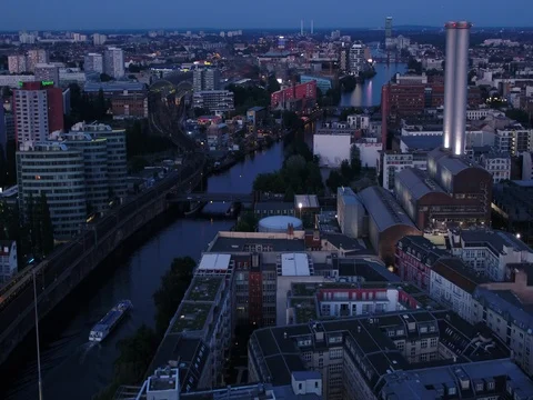 A flight over Berlin downtown in the blue hour, Fischerinsel, aerial. Video stock 79885514