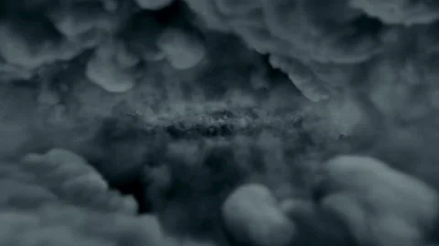 Flight over black clod Stock Footage 300202531