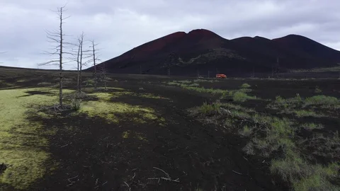 The Flight Over Black Lava Field And Dead Forest in Kamchatka. Drone Video. Stock Footage 128781230