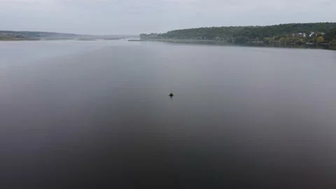 Flight over a boat with a rower Stock Footage 162246826