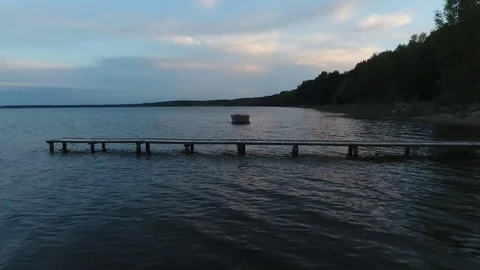 Flight over the boat on the sunset Stock Footage 115054730