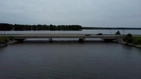 Flight over bridge with traffic opposite direction Video stock 237945350