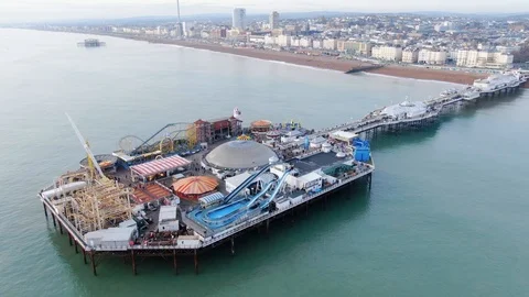 Flight over Brighton Pier and Beach in England - aerial view - BRIGHTON, ENGLAND Stock-Footage 124882429