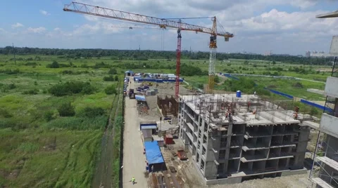 Flight over buildings under construction in Krasnodar 動画素材 58911029
