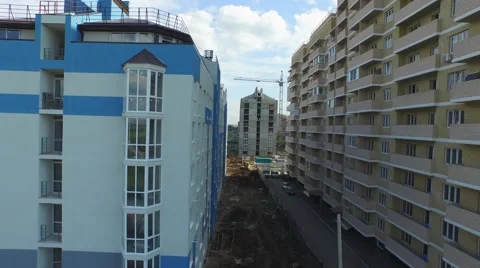 Flight over buildings under construction in Krasnodar Stock-Footage 58911990