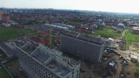 Flight over buildings under construction in Krasnodar Видео 58912051