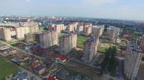 Flight over buildings under construction in Krasnodar 動画素材 58912473