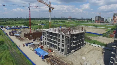 Flight over buildings under construction in Krasnodar 動画素材 58915249