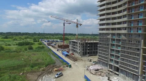 Flight over buildings under construction in Krasnodar Stock-Footage 58915252