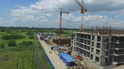 Flight over buildings under construction in Krasnodar Stock Footage 58915715