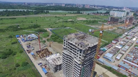 Flight over buildings under construction in Krasnodar Видео 58915749