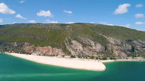 Flight Over the Bulk Beach Under the Mountain Stock Footage 89884378