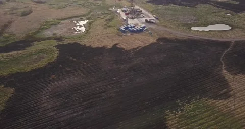 Flight over burnt field after the fire. Dangerous Stock Footage 141866054