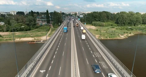 Flight over busy Lazienkowski Bridge in Warsaw 스톡 동영상 100342874