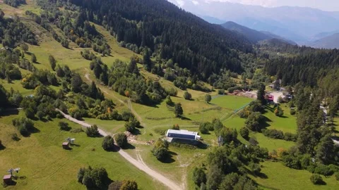 Flight over the cable car in the mountains Stock Footage 168355366