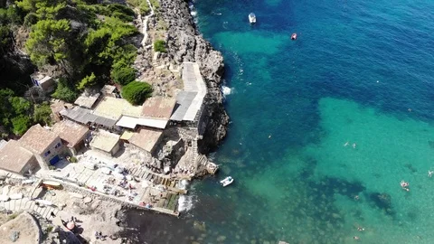 Flight over Cala Deia in Mallorca Tramuntana Mountains Stock Footage 95665175