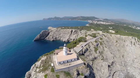 Flight over Cala Rajada´s Lighthouse on the Cliffs - Aerial Flight, Mallorca Stock Footage 38353217