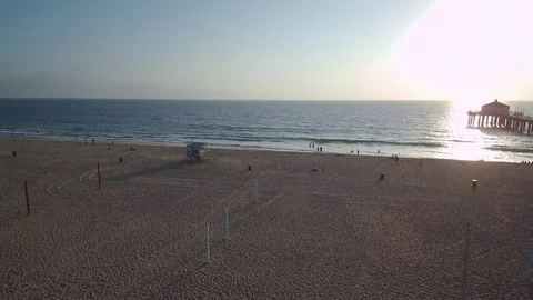 Flight over California beach during sunset Stock Footage 84873657