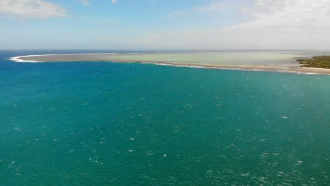 Flight over Calm Ocean Waters with Fiji Coastline 库存影片 231307339