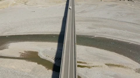 Flight over a car on a bridge. Stockbeeldmateriaal 153519339