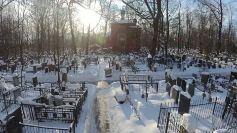 Flight over the cemetery on the background of the chapel Video stock 168280243