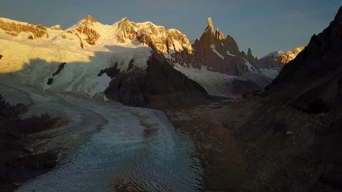 Flight over Cerro Torre mountain and Laguna Torre at sunrise. Patagonia 스톡 동영상 82029918