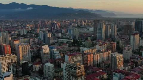Flight over the city during sunset, aerial view Stock Footage 152374699