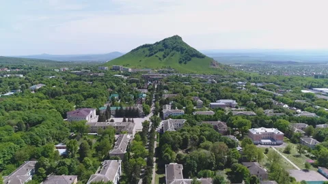 Flight over the city to the mountain Stock Footage 153029574
