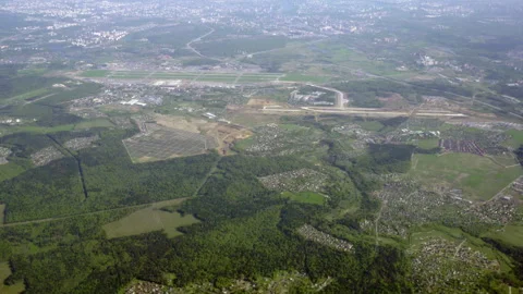 Flight over the city. A view from an airplane. Stock Footage 89780287