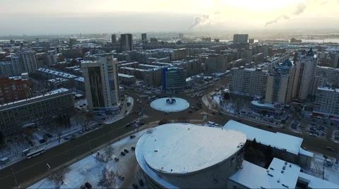 Flight over the city in winter. panorama of the city from the air Stock Footage 60762974