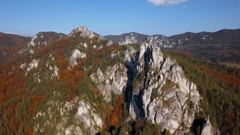 Flight over cliffs in autumn forest Stock Footage 101423183