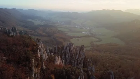 Flight over cliffs at sunset 스톡 동영상 97164766