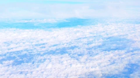 Flight over clouds, above shot - 4K Stock Footage 255576679