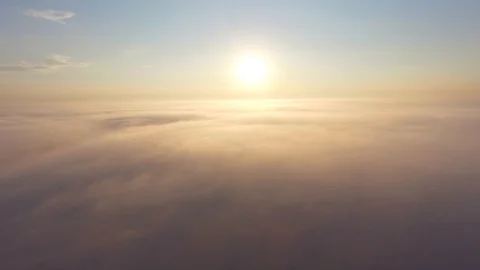 Flight over the clouds at dawn. Stock Footage 92694852