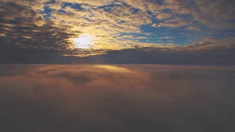 Flight over clouds Stock-Footage 76602034