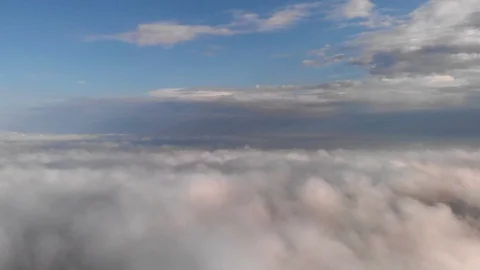 Flight over clouds Stock Footage 107351724