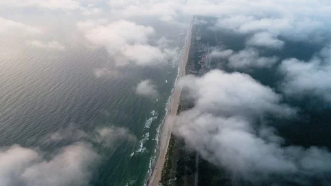 Flight over clouds at seashore Stock Footage 95065099