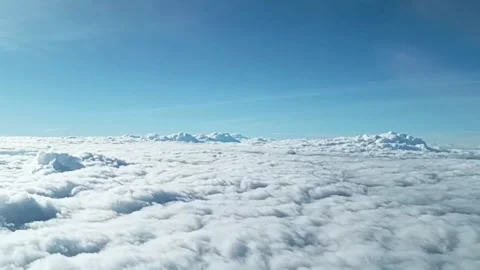 Flight over the clouds. view of the clouds from the airplane window Stock Footage 277341173