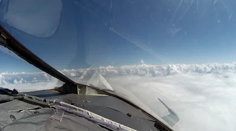 Flight over clouds view from cockpit pla... | Stock Video | Pond5