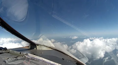 Flight over clouds view from cockpit pla... | Stock Video | Pond5