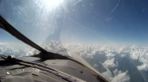 Flight over clouds view from cockpit pla... | Stock Video | Pond5