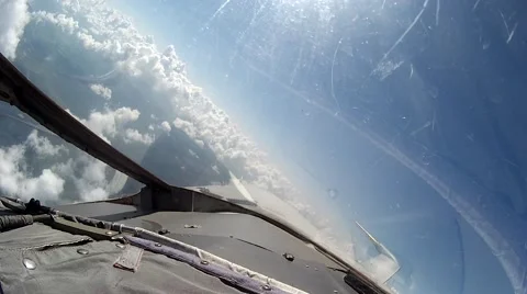 Flight over clouds view from cockpit pla... | Stock Video | Pond5