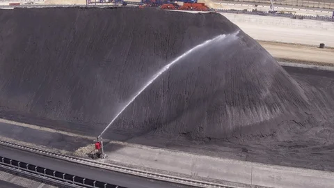 Flight over coal storage and water Stock-Footage 123700364